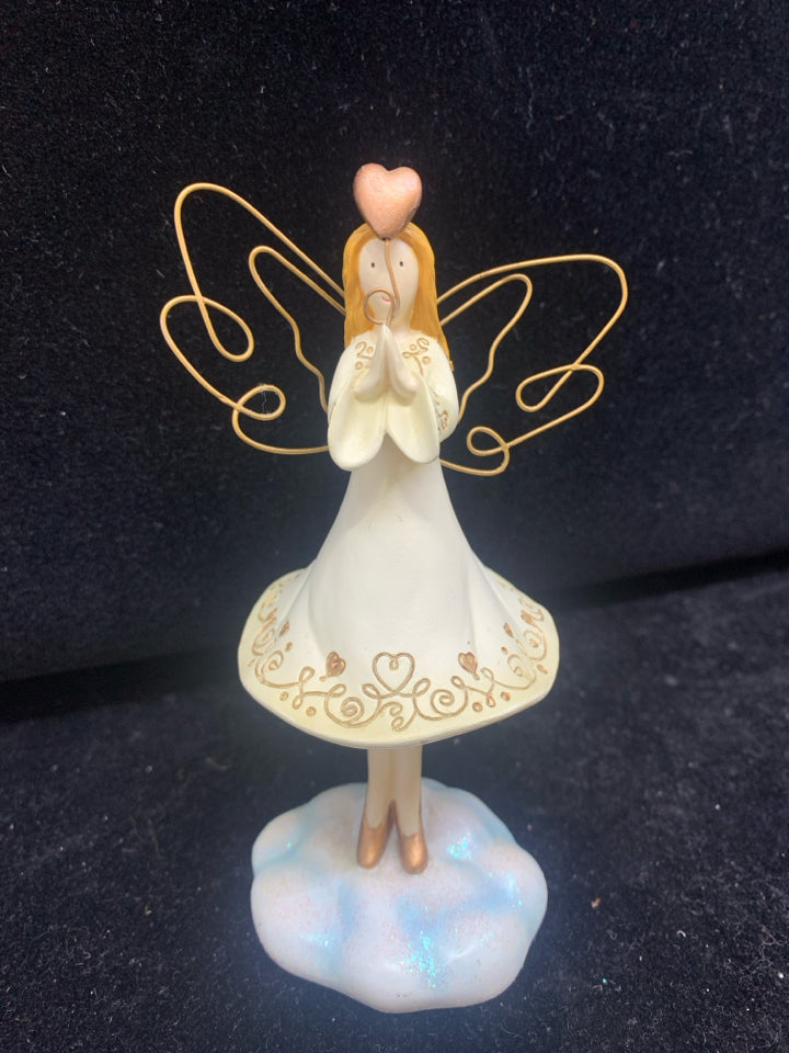 ANGEL BOBBLE HOLDING A HEART BALLOON.