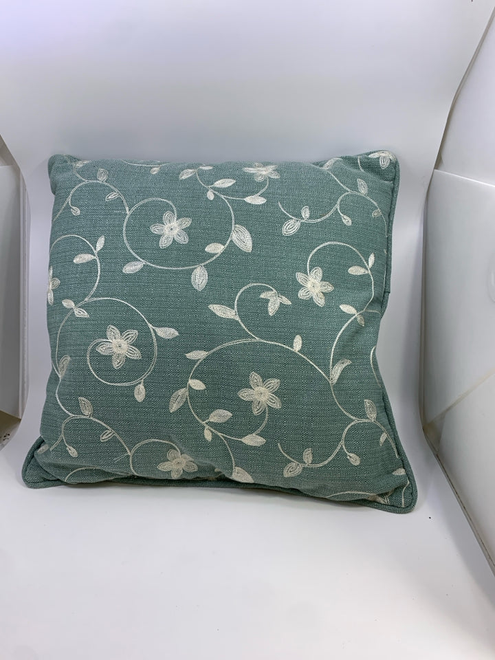 BLUE EMBROIDERED FLOWER PILLOW.