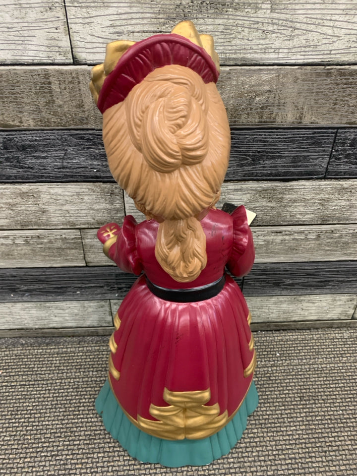 VTG LARGE WOMAN CAROLER FIGURE.