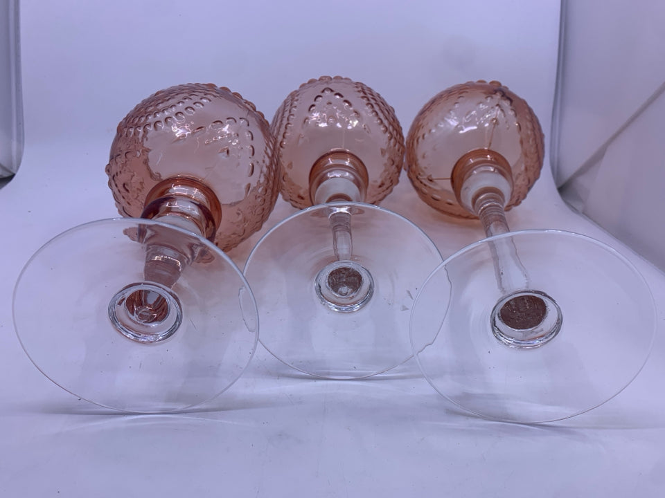 3 PALE PINK EMBOSSED CANDLE HOLDERS.