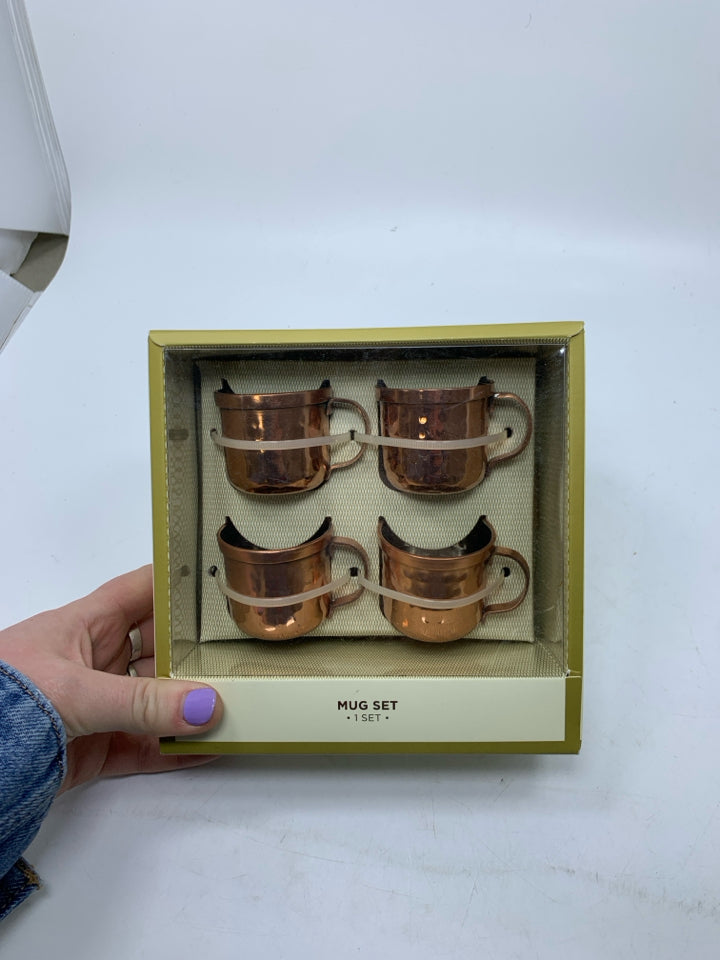 4 NEW MINI COPPER PLATED MUGS.