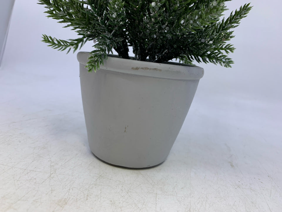 GLITTER FAUX TREE IN WHITE PLANTER.