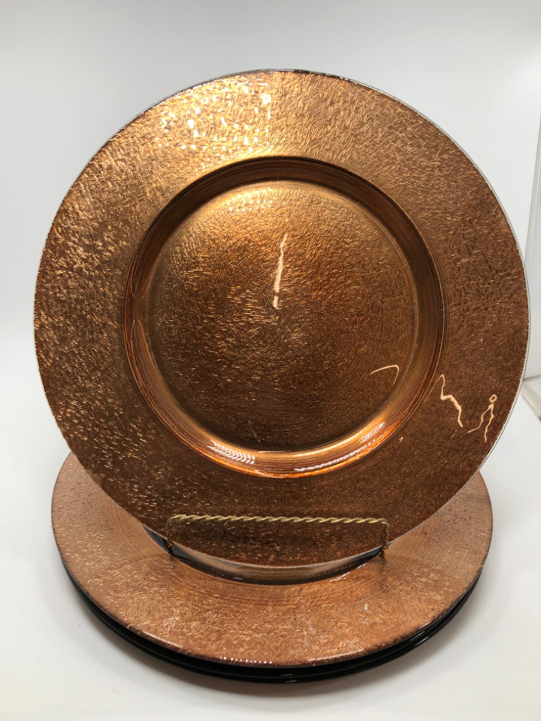 4 BROWN CHARGER PLATES.