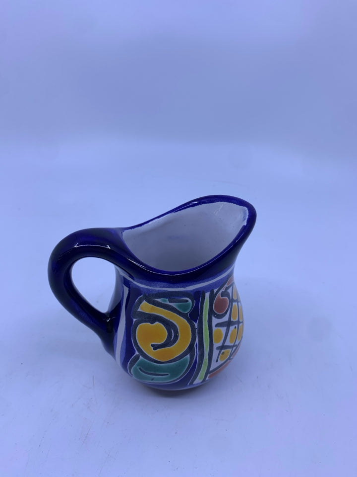 SMALL COLORFUL PAINTED PITCHER.