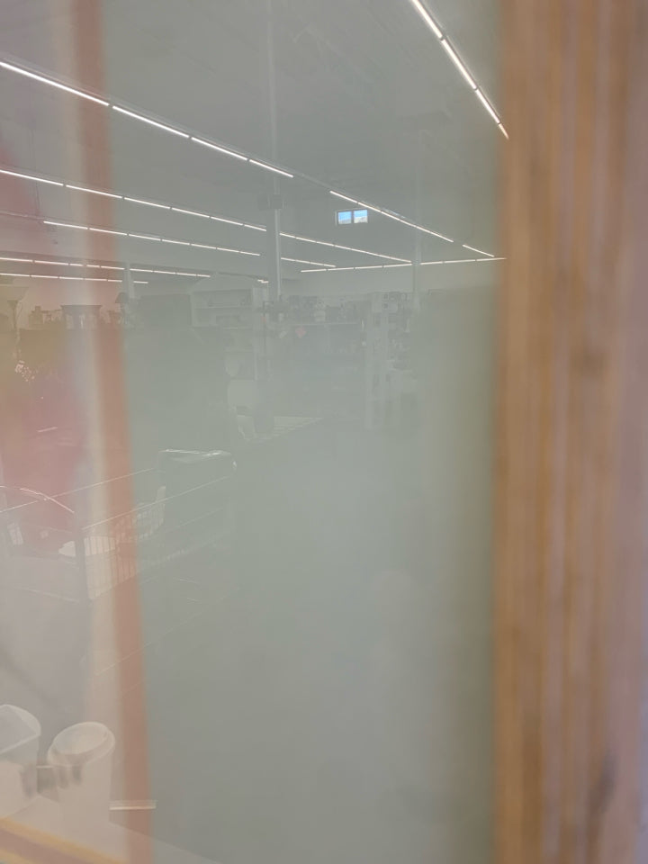 PINK FLOWER WATERCOLOR IN WHITEWASHED WOOD FRAME.