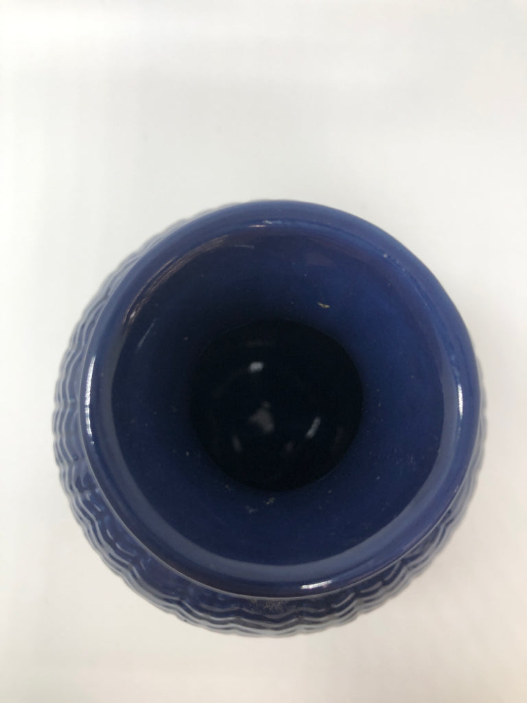 BLUE CERAMIC RIBBED VASE.