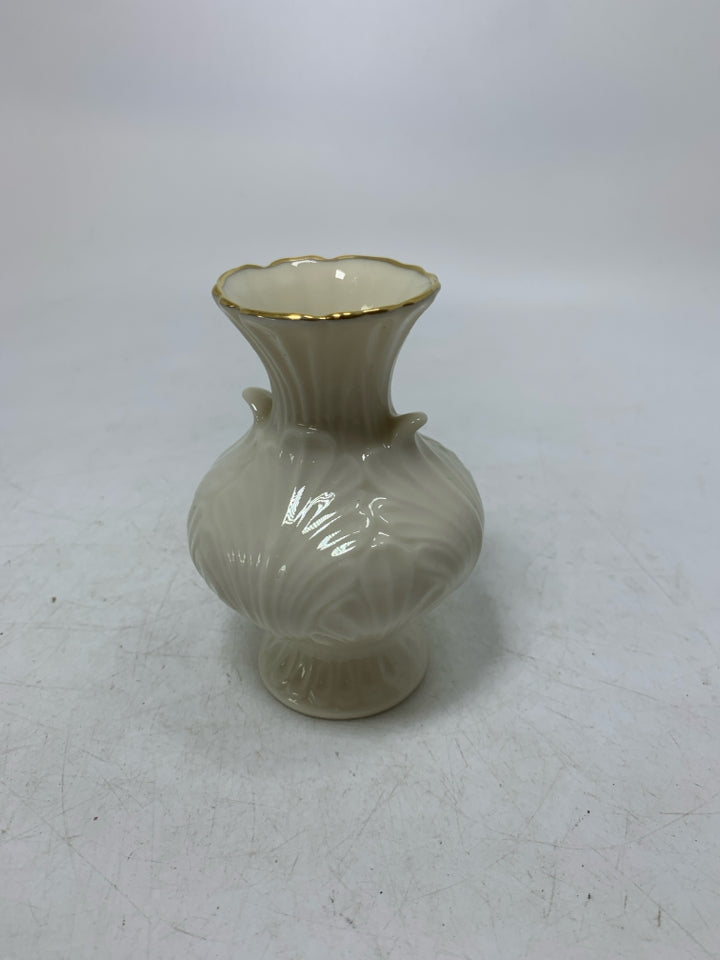 FOOTED TEXTURED LEAF BUD VASE.