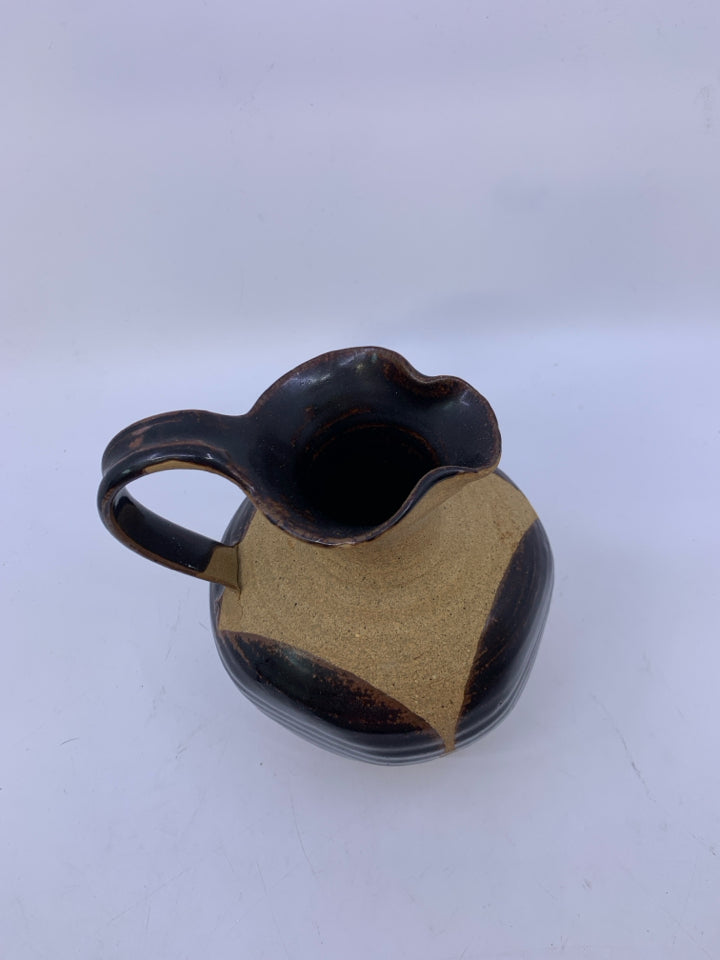 MATTE TAN PITCHER W/ LARGE DARK BROWN SPOTS/INSIDE.