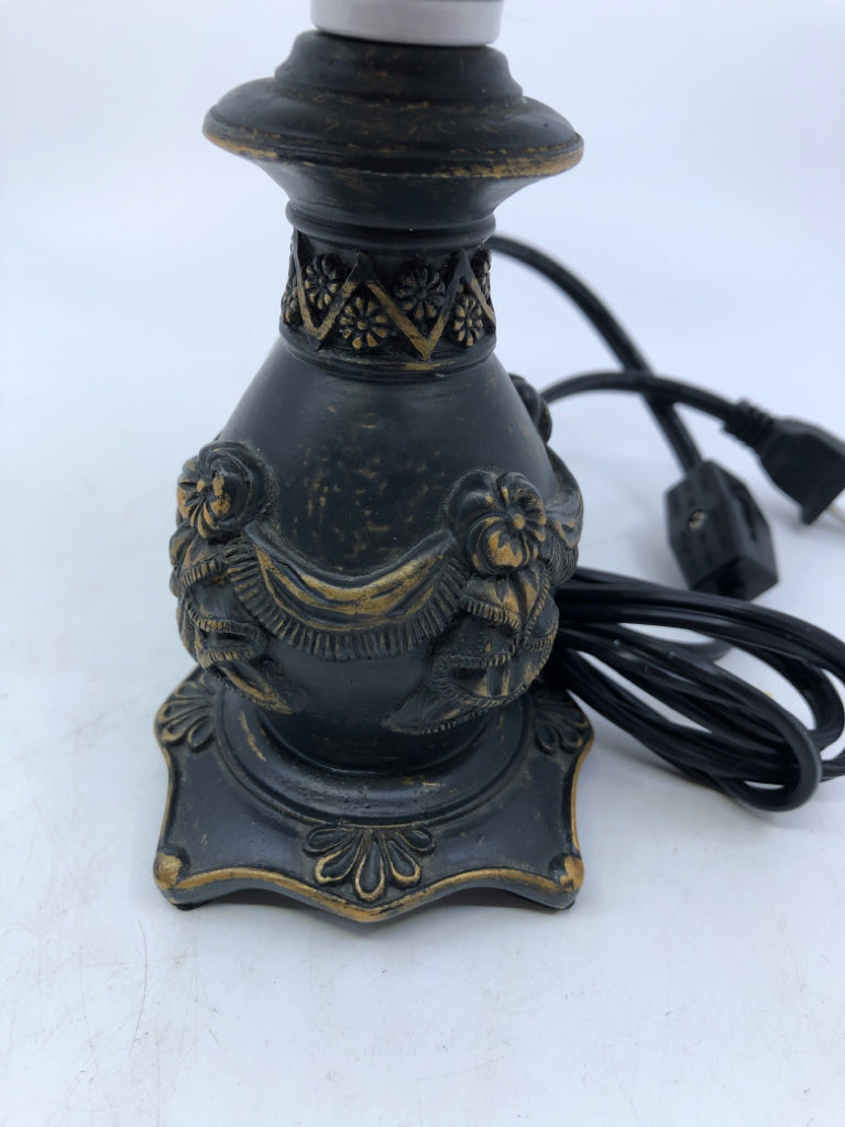 BLACK SCROLL PATTERN LAMP W RED SHADE.
