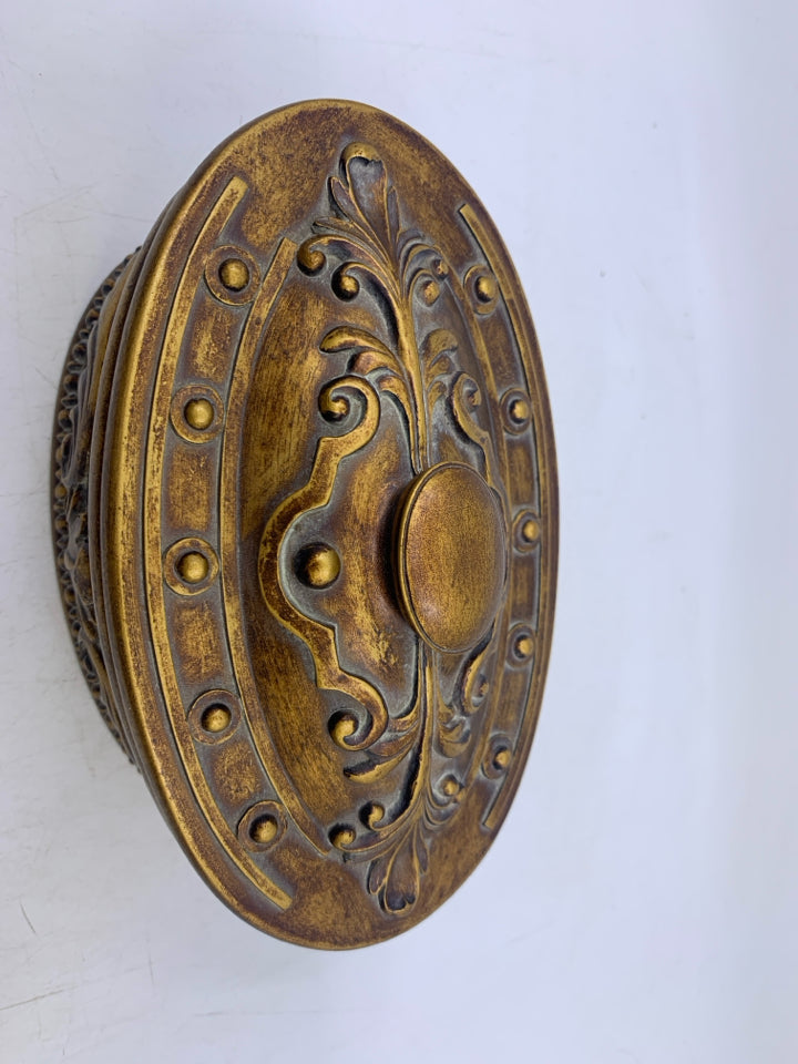 OVAL HEAVY BRONZE/GOLD EMBOSSED SCROLL COVERED TRINKET BOX.