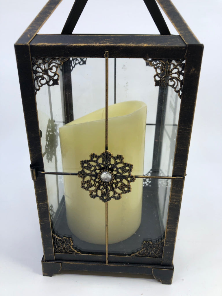 BRONZE LANTERN W/BATTERY CANDLE.