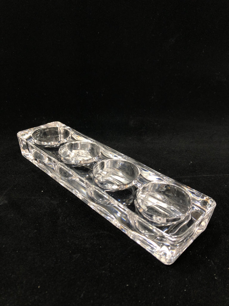CLEAR GLASS VOTIVE HOLDER.