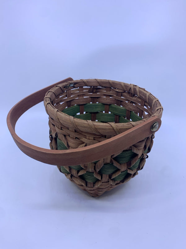 BROWN AND GREEN WOVEN BASKET.