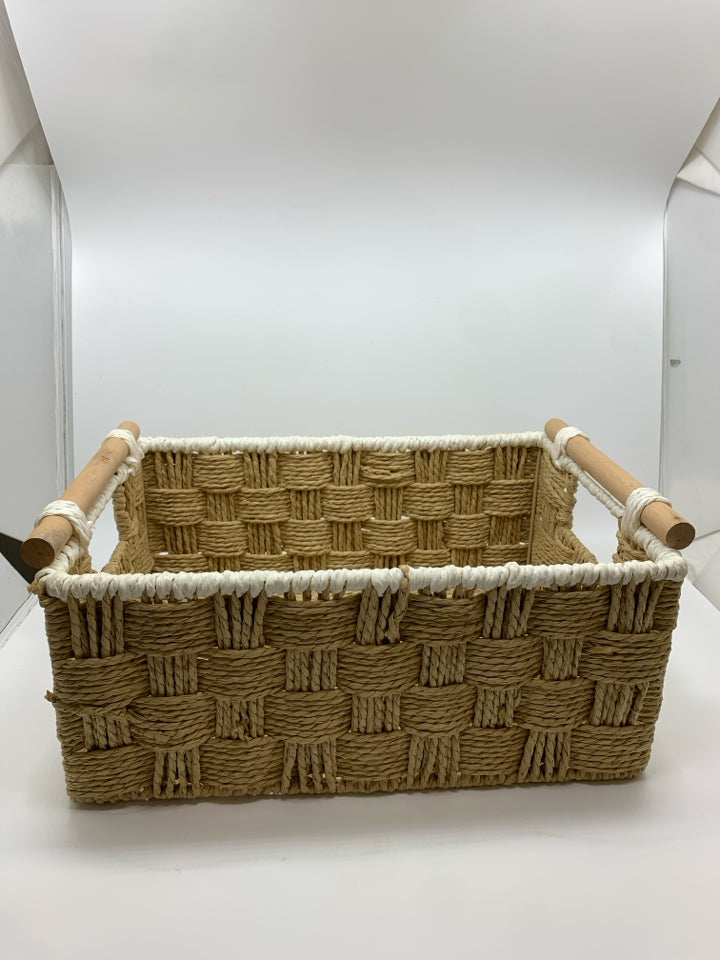 WOVEN BASKET W/DOWEL HANDLES AND WHITE EDGE.