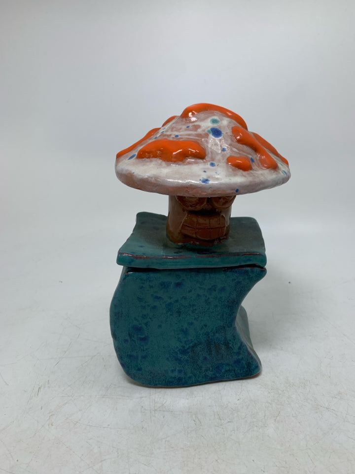 HOME MADE BLUE CANISTER W/ MUSHROOM TOP.