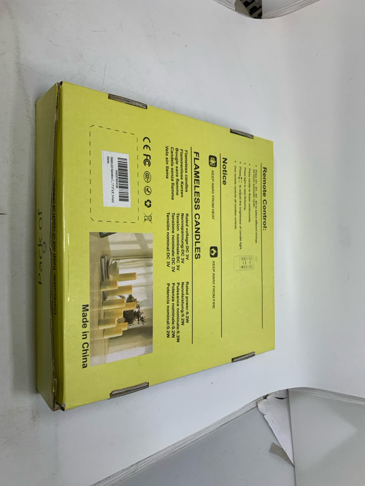 IN BOX 9 FLAMELESS CANDLES.