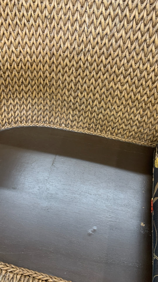 WICKER SOFA W/BROWN CUSHION.