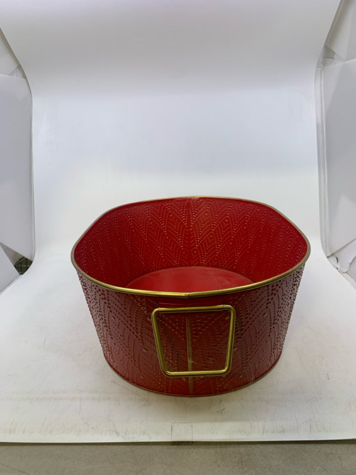 OVAL RED METAL W/ GOLD EMBOSSED DESIGNS.