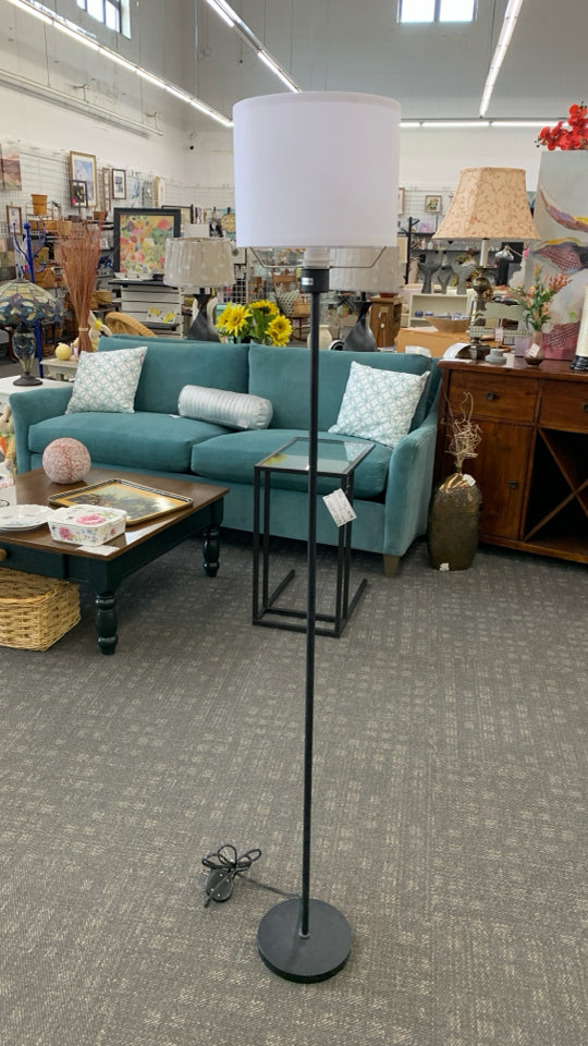 BLACK METAL PENCIL FLOOR LAMP W/ WHITE SHADE.