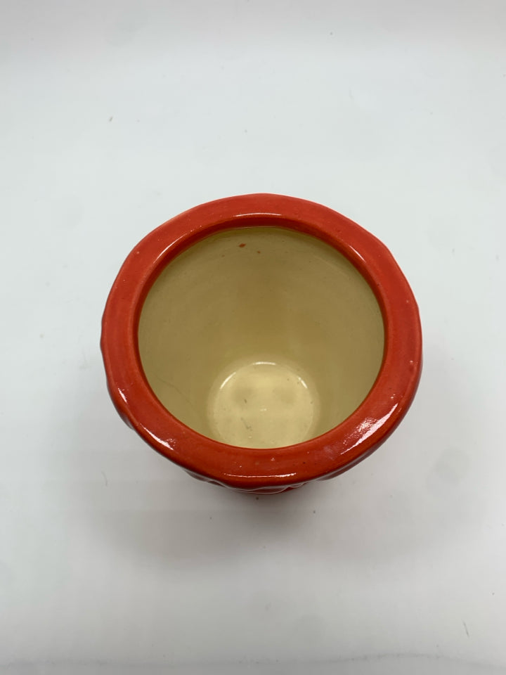 RED CERAMIC POT.
