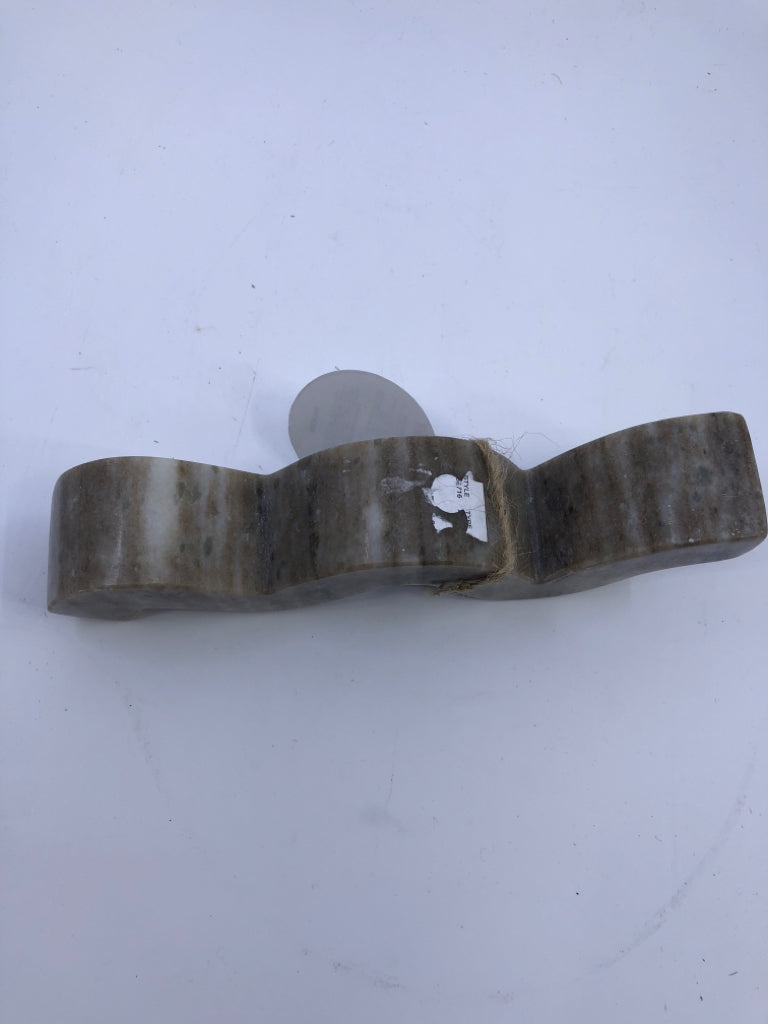 2 STONE WAVY TAPER CANDLE HOLDERS.