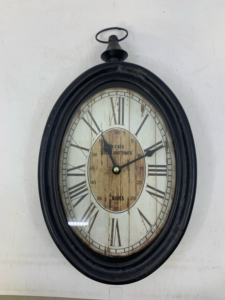 VINTAGE STYLE OVAL WALL CLOCK.