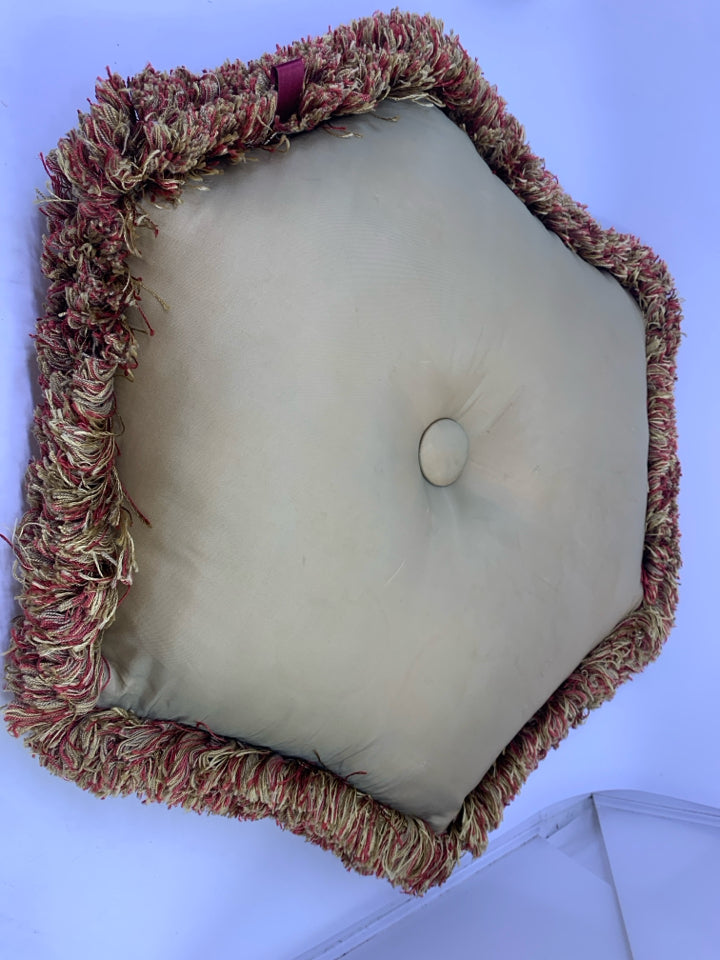 GOLD/RED HEXAGON PILLOW WITH FRINGE.
