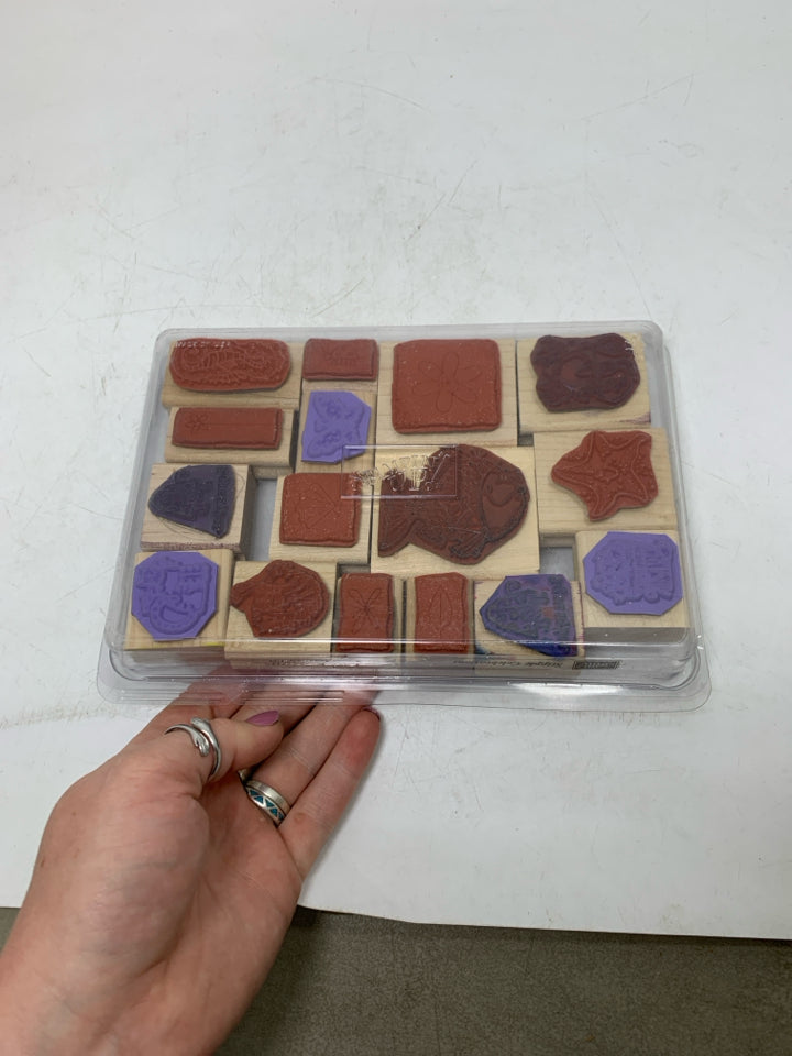 STAMPS IN CASE.