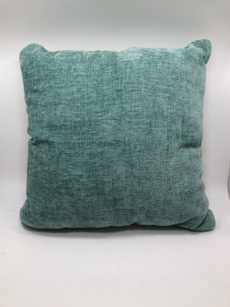 TEAL FABRIC PILLOW.
