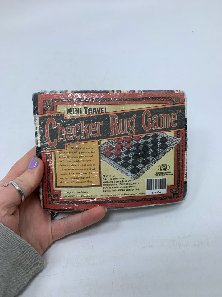 NIP CHECKERS RUG GAME.