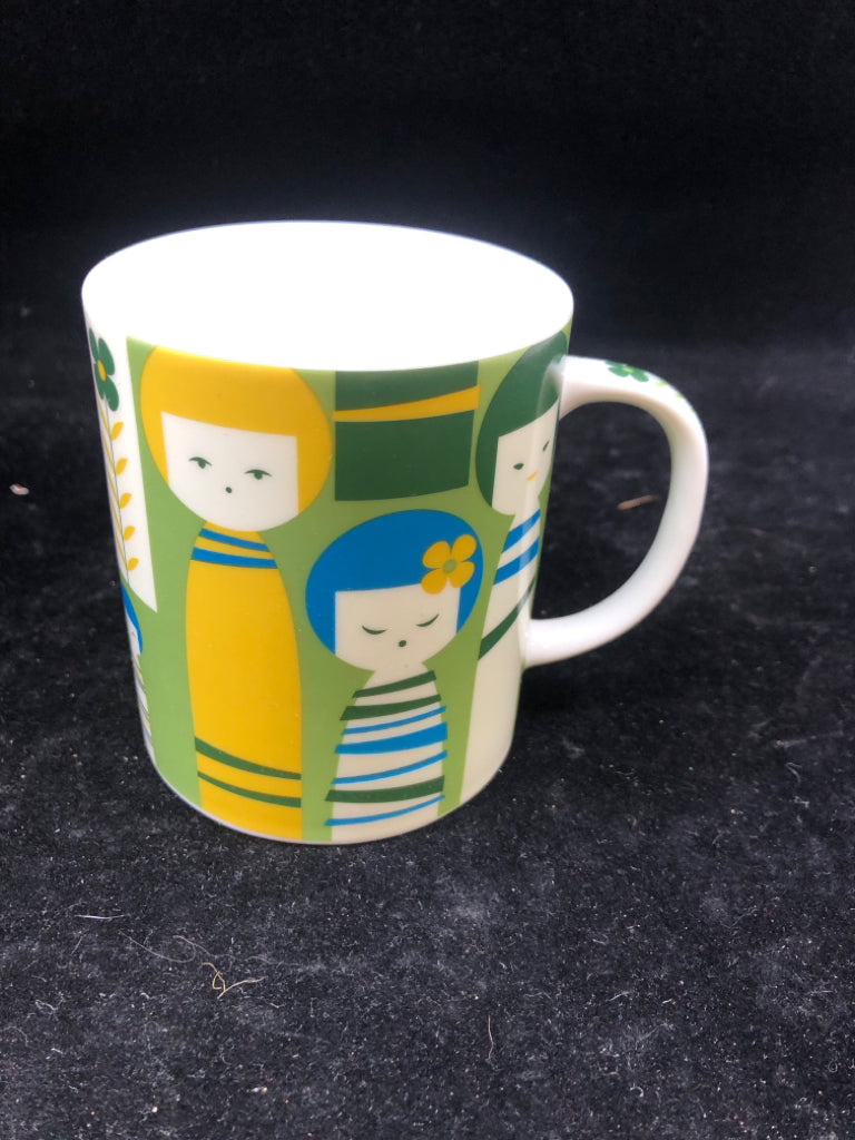GREEN LITTLE GIRLS FACE MUG.