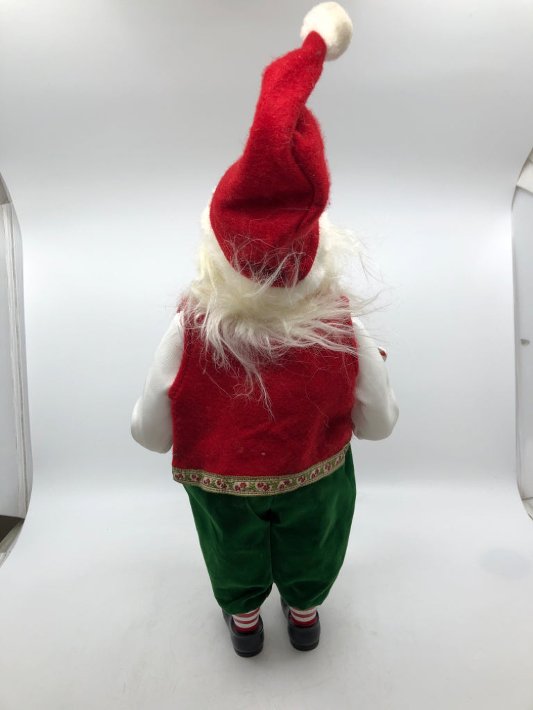 STANDING SANTA HOLDING GARLAND W/ RED VEST.