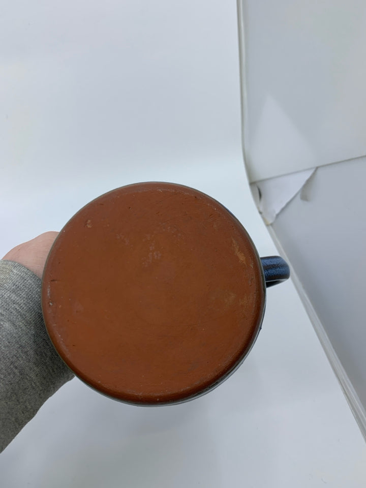 LIGHT BLUE RIBBED POTTERY PITCHER.