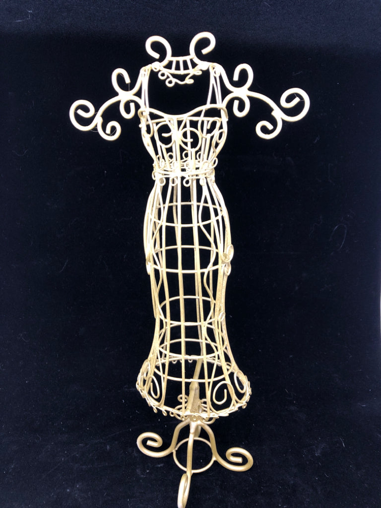 CREAM METAL DRESS SHAPED JEWELRY HOLDER.
