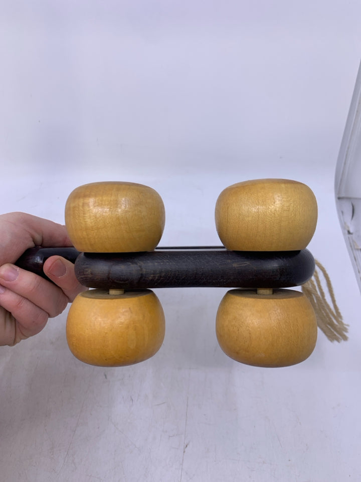 ROLLING 2 TONED WOOD HORSE.