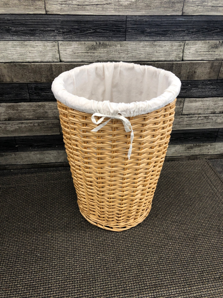 LINED WICKER LAUNDRY HAMPER BASKET.