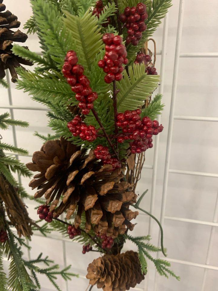 PINECONES AND RED PIP BERRY GARLAND.