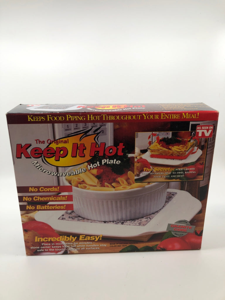 NIB MICROWAVEABLE HOT PLATE.