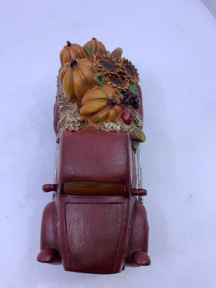 RED CERAMIC TRUCK WITH PUMPKINS/SUNFLOWERS.