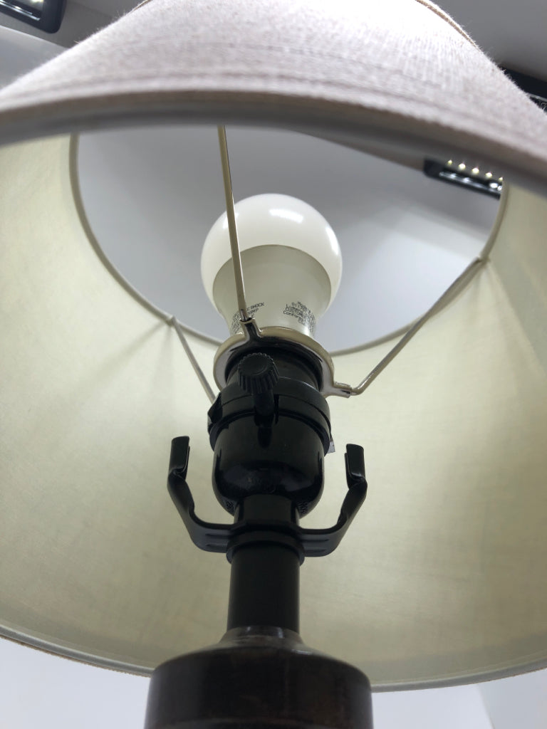 FAUX STONE/METAL STACKED LIGHT CONE SHADE.