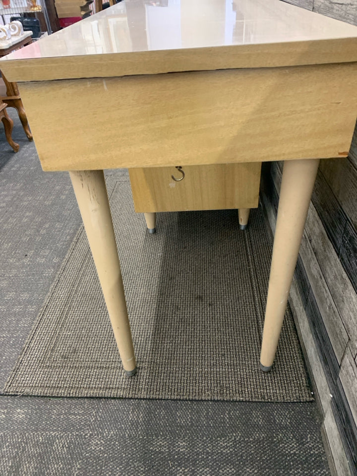 VTG BLONDE DESK W 3 DRAWERS.