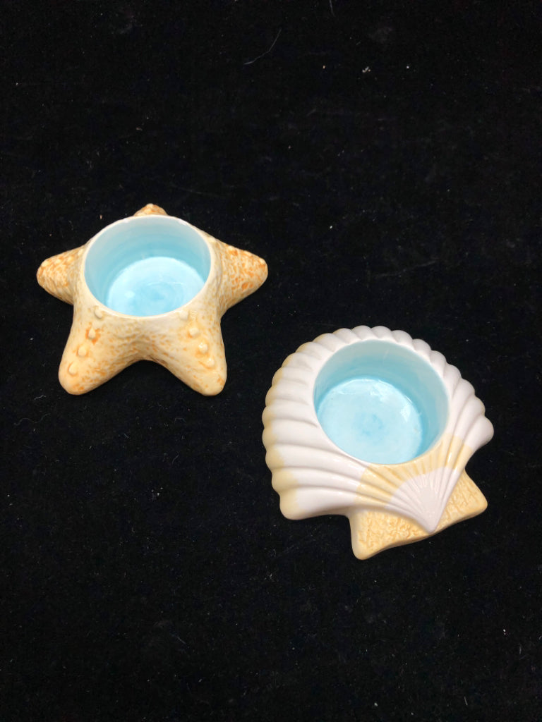 2 STARFISH/SEASHELL GLAZED CANDLE HOLDERS.