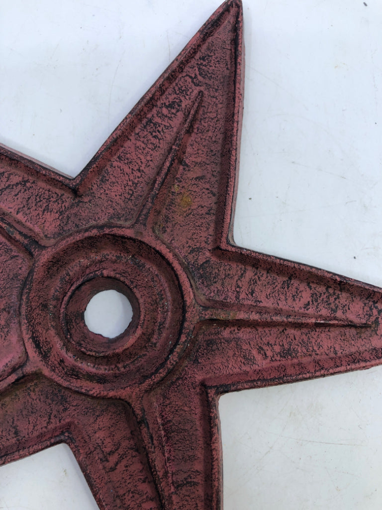 PRIMITIVE RED STAR W HOLE IN MIDDLE.