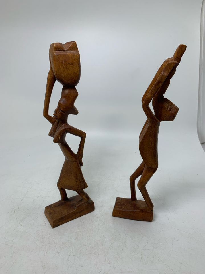2 LIGHT WOOD CARVED FOLK ART MAN/WOMAN.