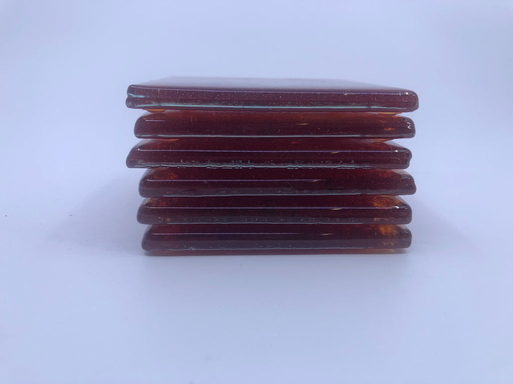 6 RED BLOWN GLASS COASTERS.