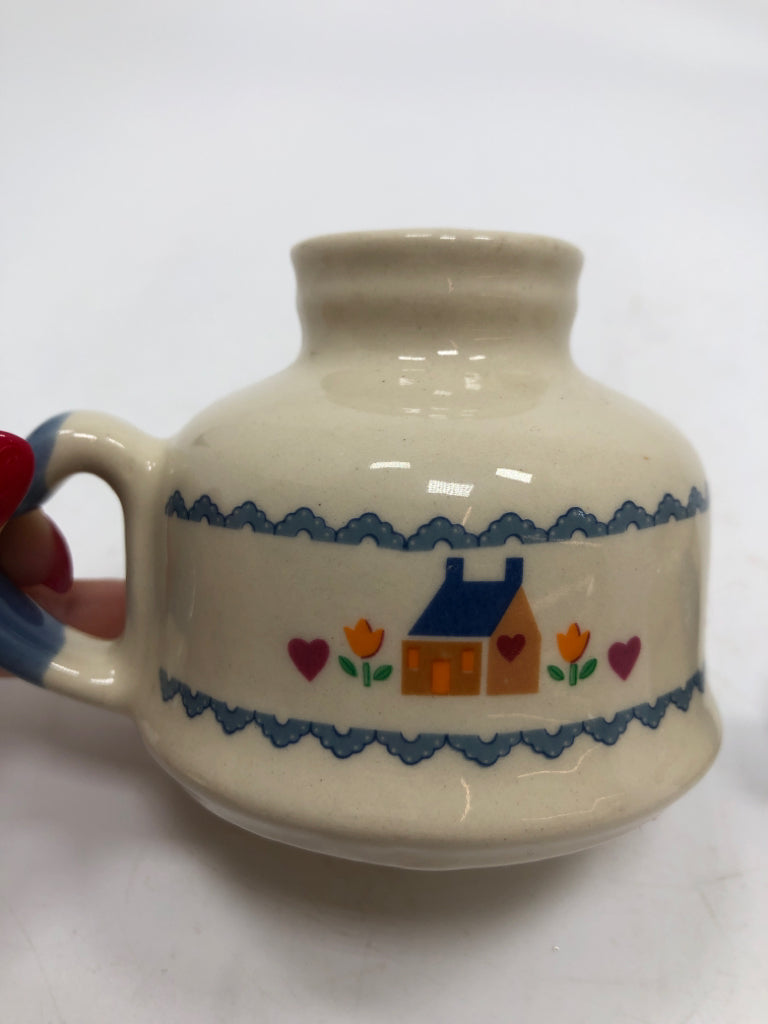 2 COUNTRY HOUSE CERAMIC CANDLE STICK HOLDERS.