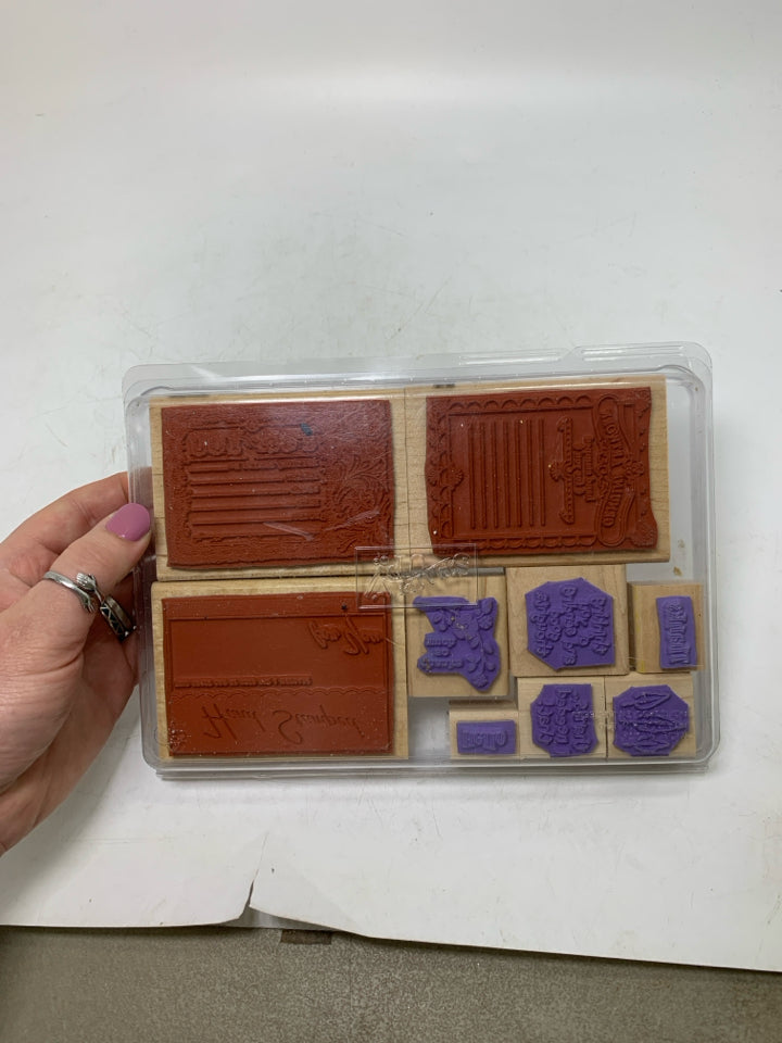 STAMPS IN CASE.
