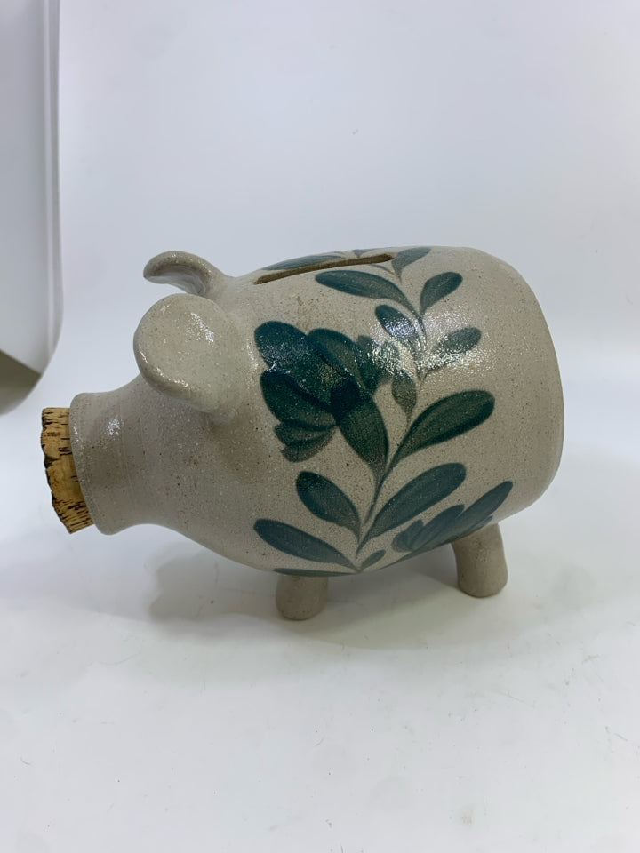 STONEWARE PIGGY BANK W/CORK SNOUT & PAINTED LEAVES.