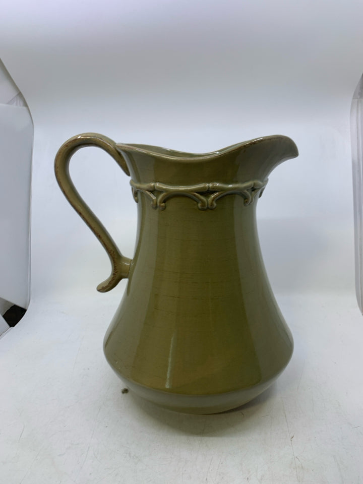 LARGE CERAMIC PITCHER W/ EMBOSSED DETAILED NECK.