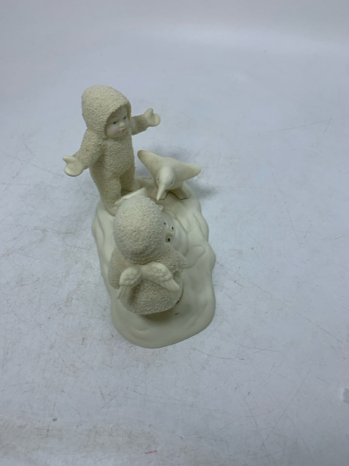 2 BABIES LOOKING AT MELTED SNOWMAN SNOWBABIES.
